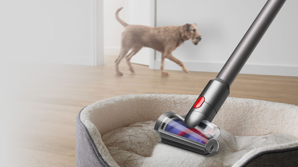 Hair screw tool sucking up hair from pet bed