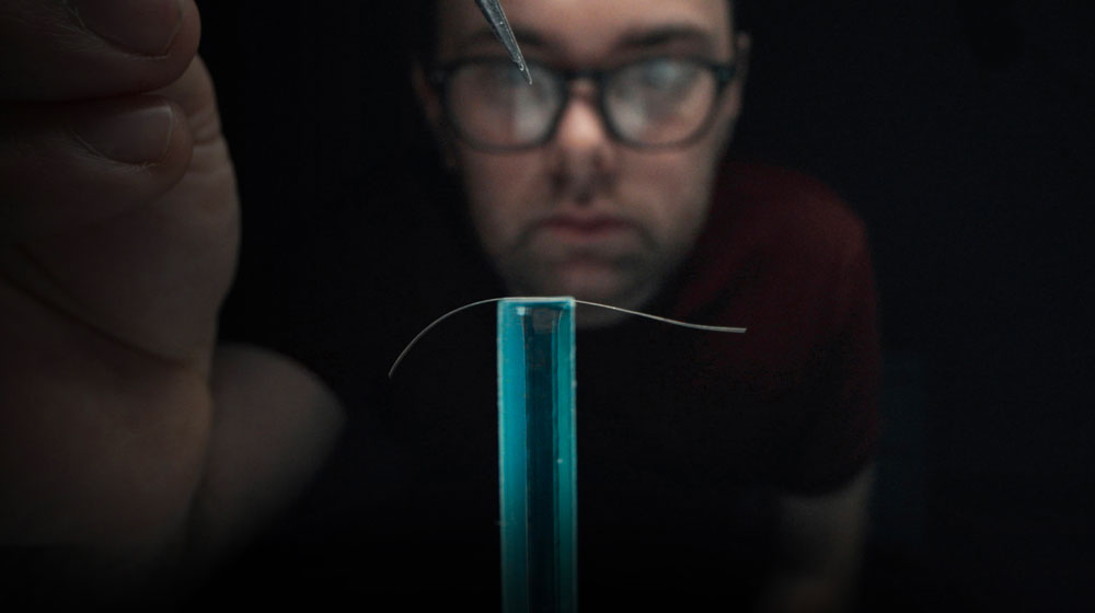 Dyson V8 vacuum in handheld mode, Woman emptying a Dyson V8 vacuum, Woman storing Dyson V8 vacuum in Wall Dok