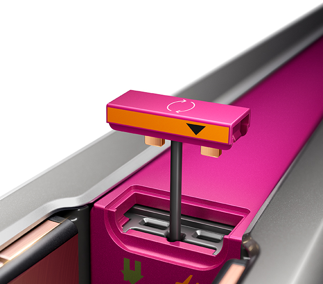 A woman holding the Dyson digital motor V9